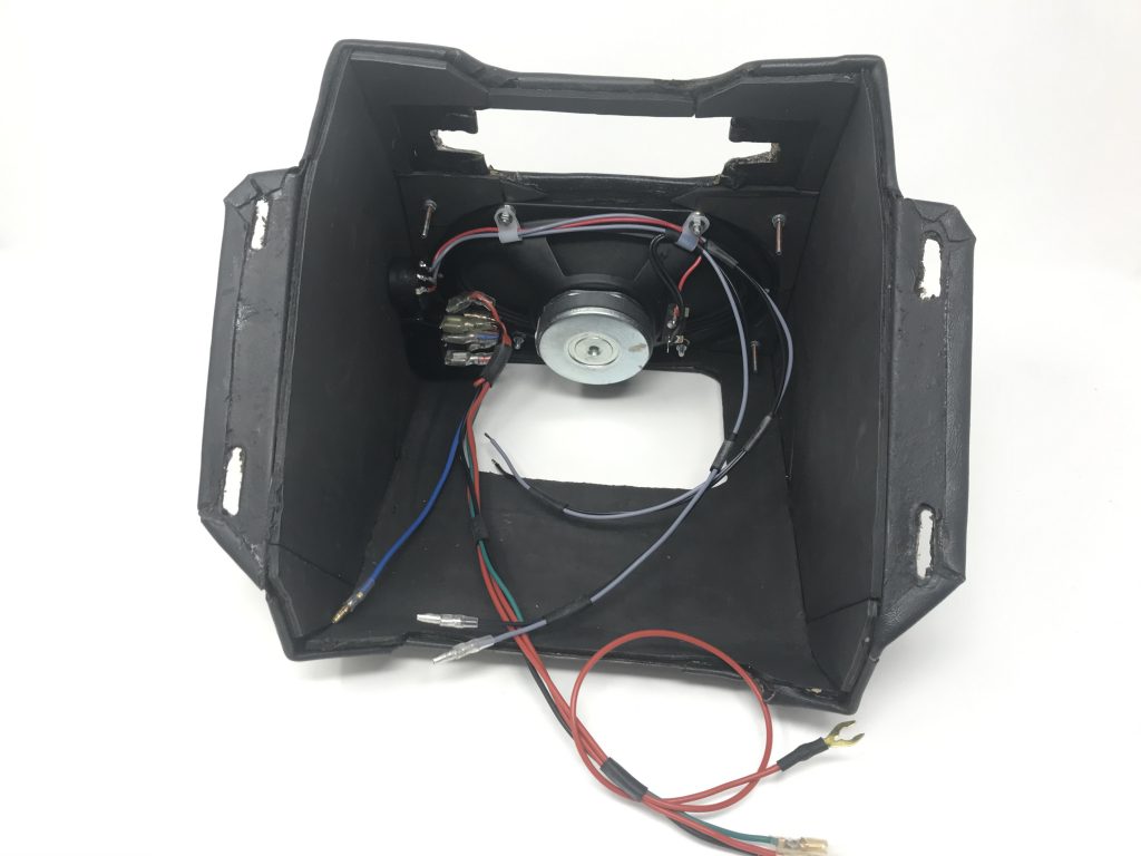 Aston Martin DB6 radio console showing replacement 7" x 4" speaker, balance control and aerial toggle switch wiring loom