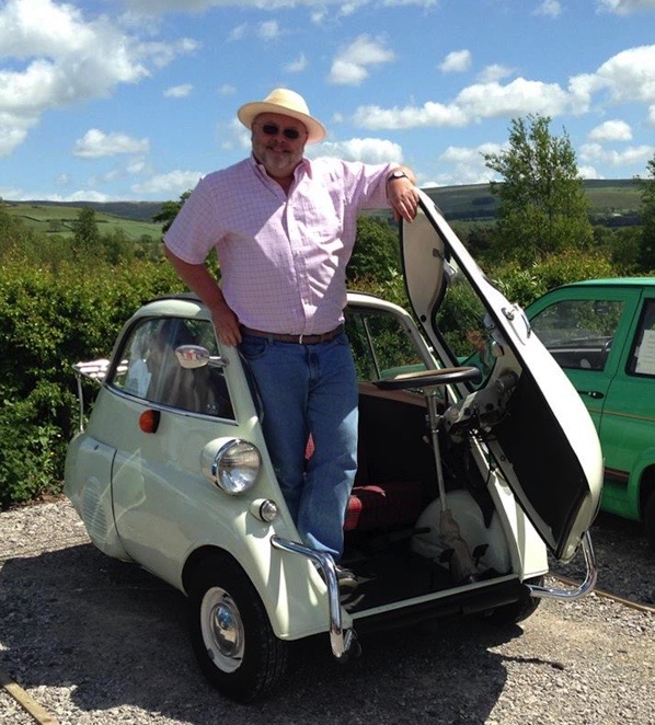 Happy customer and his Isetta enjoying the sunshine at a rally in Belgium 